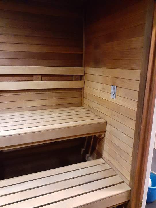 Close-up of sauna wood treatment and care